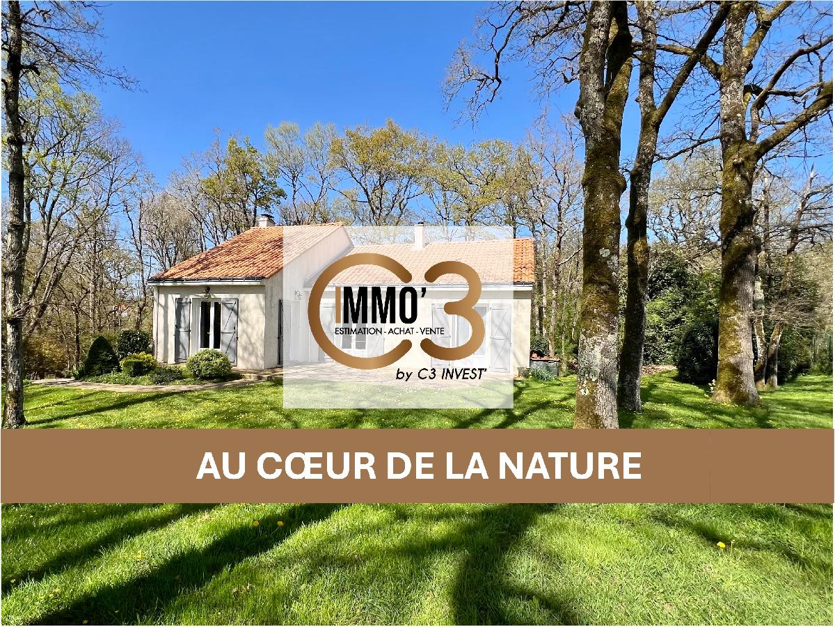 Maison familiale de 120 m², avec 3 chambres et grand sous-sol sur une magnifique parcelle boisée